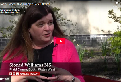 Sioned Williams MS speaking outdoors during a BBC Wales Today interview, discussing abortion care.