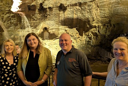 Sioned and Beca with hosts in Dan yr Ogof Cave