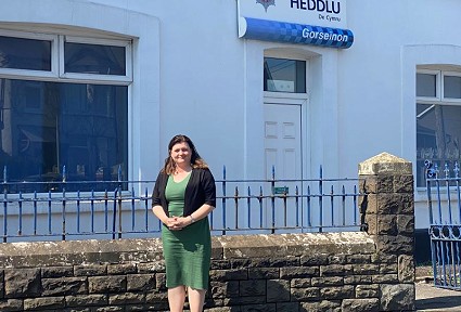 sioned williams standing outside of a police station