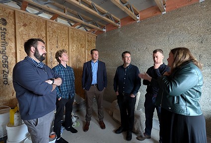 Sioned Rhun and Luke meeting with house builders
