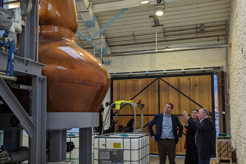 Sioned Williams MS and Leader of Plaid Cymru Rhun ap Iorwerth having a tour around Penderyn whiskey distillery in Swansea Copperworks