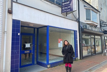 sioned williams outside an empty shop
