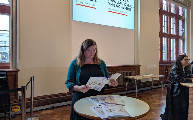 Sioned reading the report