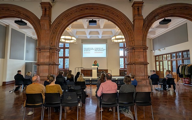 Sioned speaking on the stage at launch